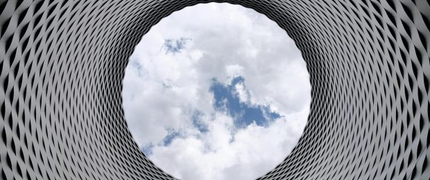 pexels-photo-210158-210158 Modern architectural tunnel with a geometric pattern revealing a bright sky.